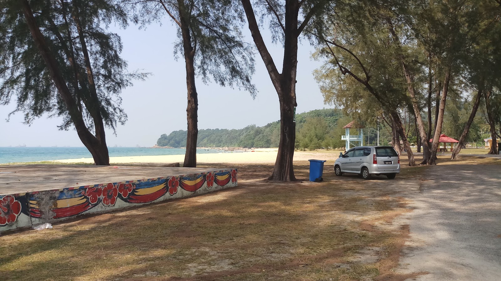 Fotografija Teluk Kalong Beach z dolga ravna obala