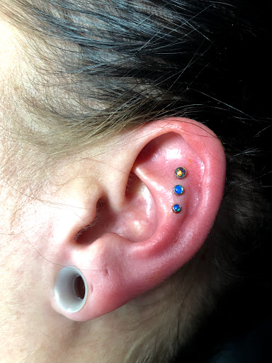 Explore chevy bowtie tattoo ideas, creative tattoo ideas in Bloomington, available at Evil by the Needle Custom Tattoo and Piercing Studio