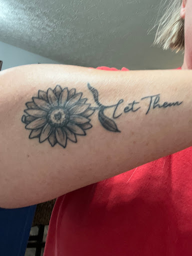 Explore thigh flower tattoo ideas, creative tattoo ideas in Seymour, available at 3 Sevens Tattoo