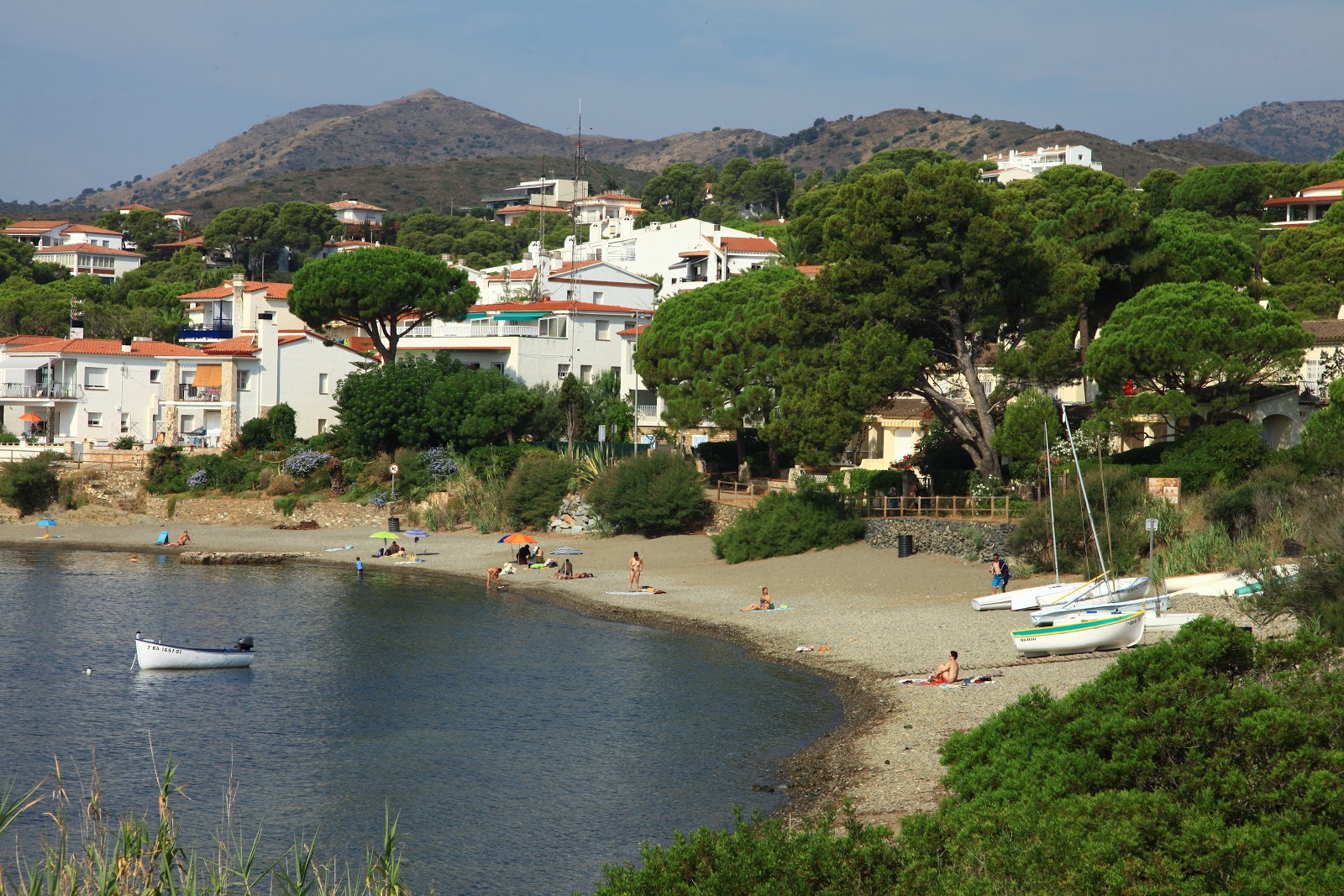 Photo of Platja el Rastell with green pure water surface
