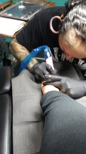 Explore forearm tattoo idea for men, creative tattoo ideas in Council Bluffs, available at Lil Bros Tattoo
