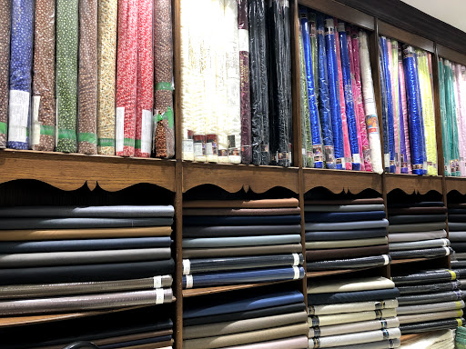 مؤسسة علي حسين الخليفة للأقمشة الرجالية بالجملة والمفرق 