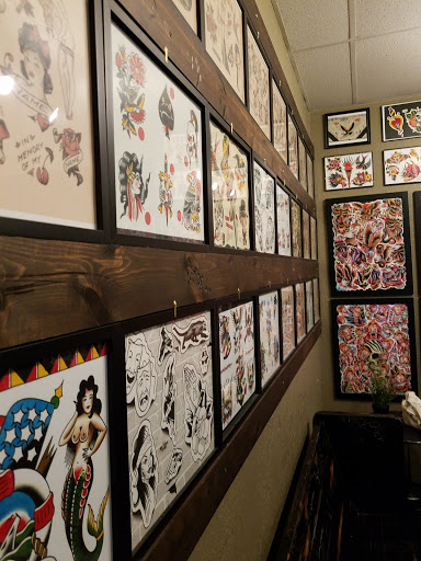 Explore cheshire cat tattoo ideas, creative tattoo ideas in Lakeland, available at Black Swan Tattoo