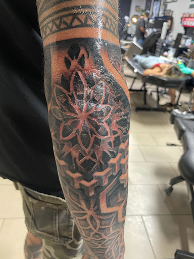 Explore practical magic tattoo ideas, creative tattoo ideas in Sarasota, available at SEVEN SINS Tattoo Studio