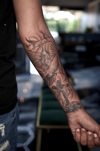 Explore infant loss tattoo ideas, creative tattoo ideas in Westwood, available at Dom Astro Tattoo Company