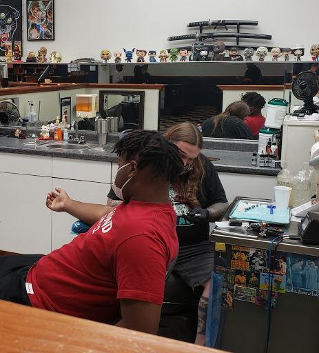 Explore bob's burgers tattoo ideas, creative tattoo ideas in Hampton, available at Blue Horseshoe Tattoo and Body Piercing