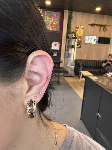 Explore rib tattoo ideas for women, creative tattoo ideas in West Palm Beach, available at Wooden Heart Tattoos and Piercings