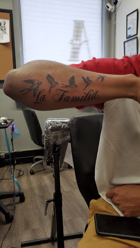 Explore tattoo flag ideas, creative tattoo ideas in Lancaster, available at InkCredible Tattoo