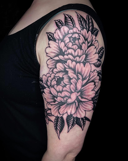Explore black and grey realism tattoo ideas, creative tattoo ideas in Johnson City, available at Gold Cross Tattoo Co.
