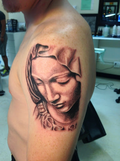 Explore tattoo ideas breast cancer ribbon, creative tattoo ideas in San Diego, available at Wylde Sydes Tattoo & Body Piercing