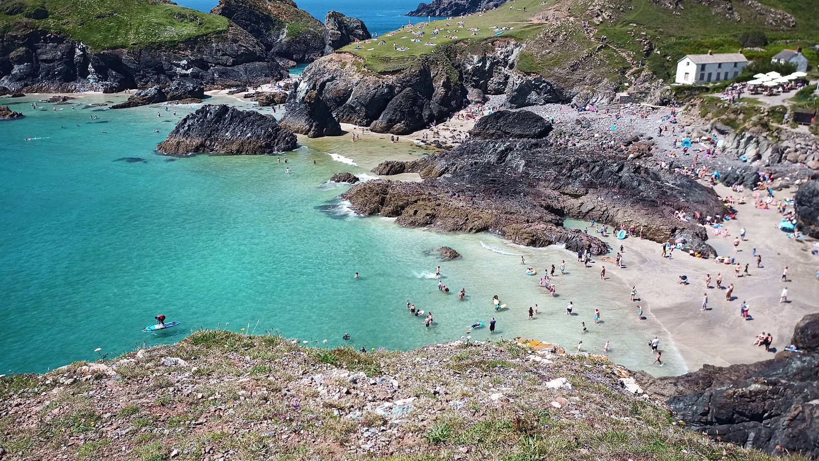 Photo of Kynance Cove with bright sand surface