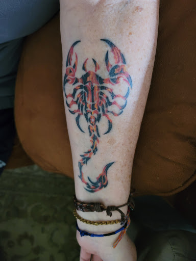 Tattoo Shop «Atomic Tattoos and Piercing», reviews and photos, 2850 Curry Ford Rd, Orlando, FL 32806, USA