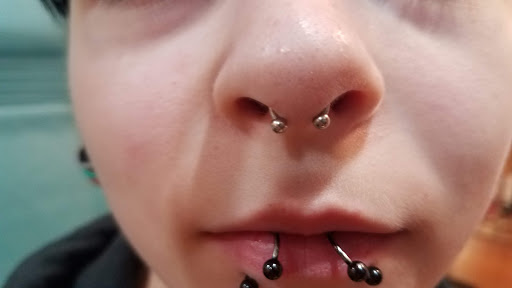 Explore neck tattoo men ideas, creative tattoo ideas in Myrtle Beach, available at Pitbull Tattoo and Piercing Clinic