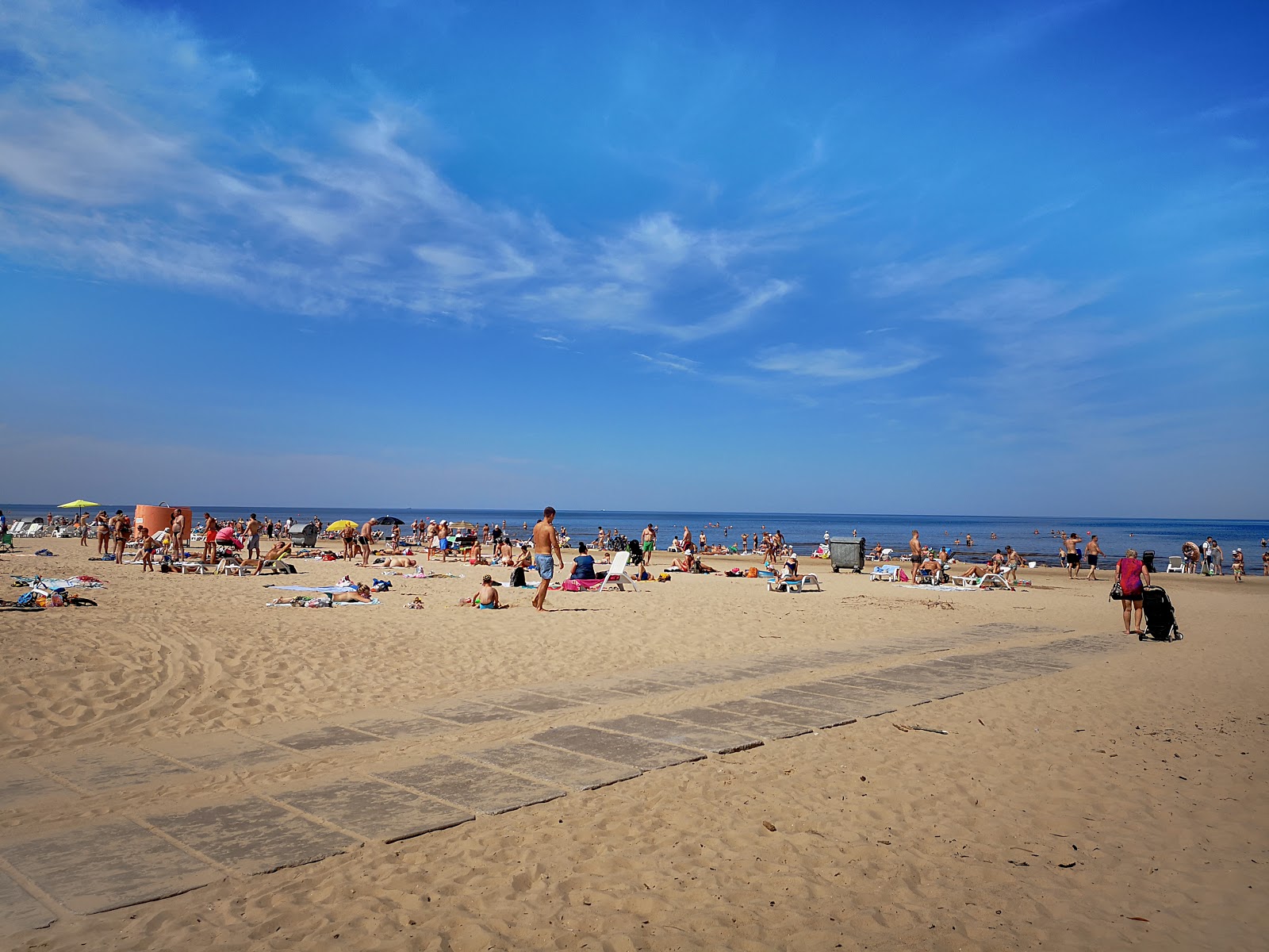 Foto von Vecaki beach mit heller sand Oberfläche