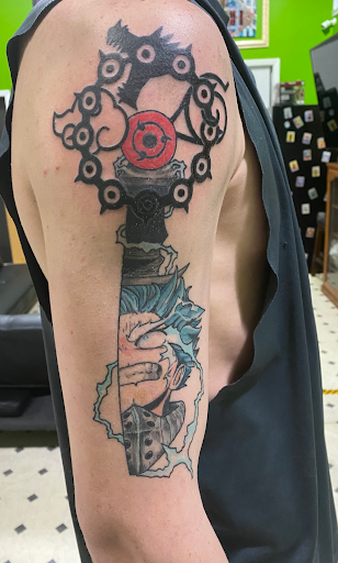 Explore male thigh tattoo ideas, creative tattoo ideas in Evansville, available at Ink Therapy 101