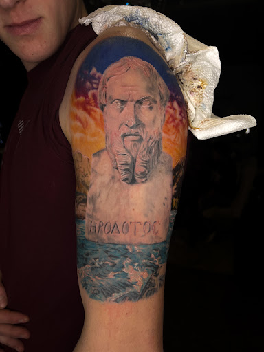 Explore impulse tattoo ideas, creative tattoo ideas in Fairmont, available at Heretic Ink
