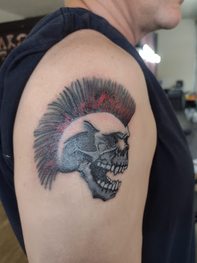 Explore reggae tattoo ideas, creative tattoo ideas in Cadillac, available at Warchief Tattoo, LLC