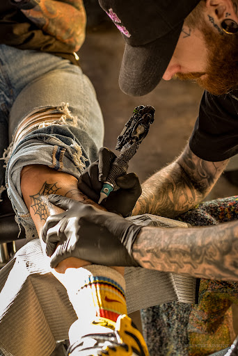 Find middle boob tattoo ideas for your next unique tattoo in Springfield at Triumph Tattoo