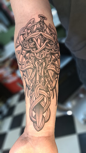 Explore tramp tattoo ideas, creative tattoo ideas in Medina, available at Art In Motion Inc Tattooing