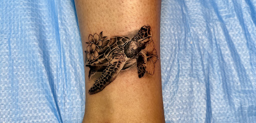 Explore february birth tattoo ideas, creative tattoo ideas in Kapolei, available at Sacred Art Tattoo and Coffee Bar - Kapolei