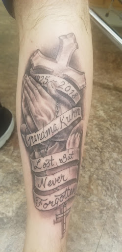 Explore interstellar tattoo ideas, creative tattoo ideas in Wheeling, available at Gregs Tattooing