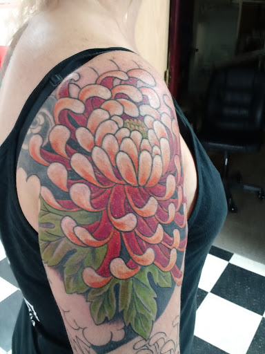 Explore wrist cross tattoo ideas, creative tattoo ideas in Black River Falls, available at Black River Tattoo