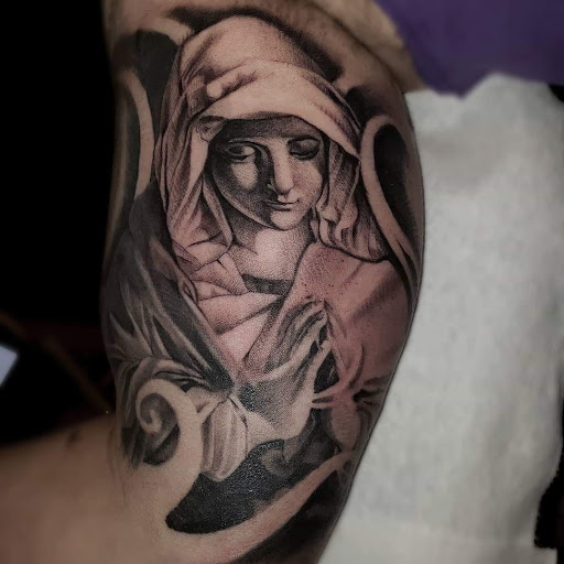 Explore tattoo ideas generator, creative tattoo ideas in Monroe, available at Vivid Art Tattoos