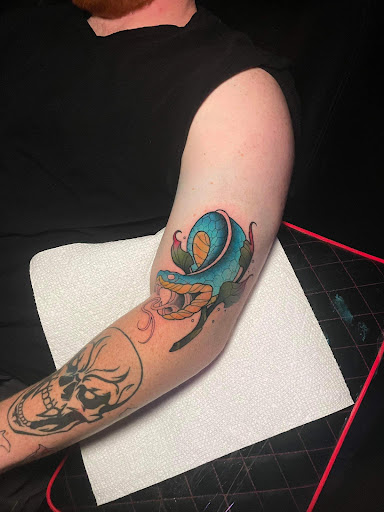 Explore tattoo ideas for side of stomach, creative tattoo ideas in Hartselle, available at Ethereal Alchemy Tattoo Collective