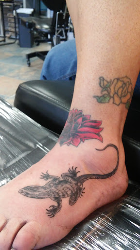 Explore son's name tattoo ideas, creative tattoo ideas in Mastic, available at Crystal Blue Tattoo