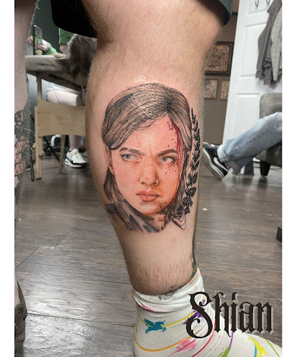 Explore women's thigh tattoo ideas, creative tattoo ideas in Benton, available at Relics Tattoo Studio