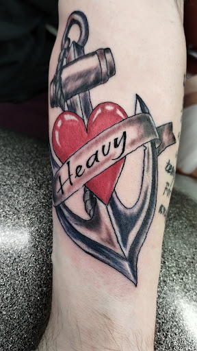 Explore arm tattoo ideas for females, creative tattoo ideas in Brodhead, available at Sinnin Skinn InkWorks