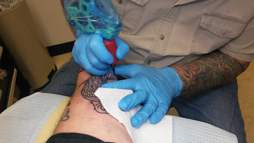 Tattoo Shop «Skin of A Different Color», reviews and photos, 2080 E New York St, Aurora, IL 60502, USA