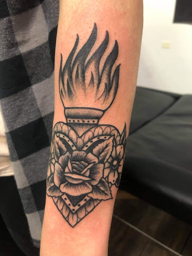 Explore strong woman tattoo ideas, creative tattoo ideas in Goose Creek, available at Red Kirin Tattoo