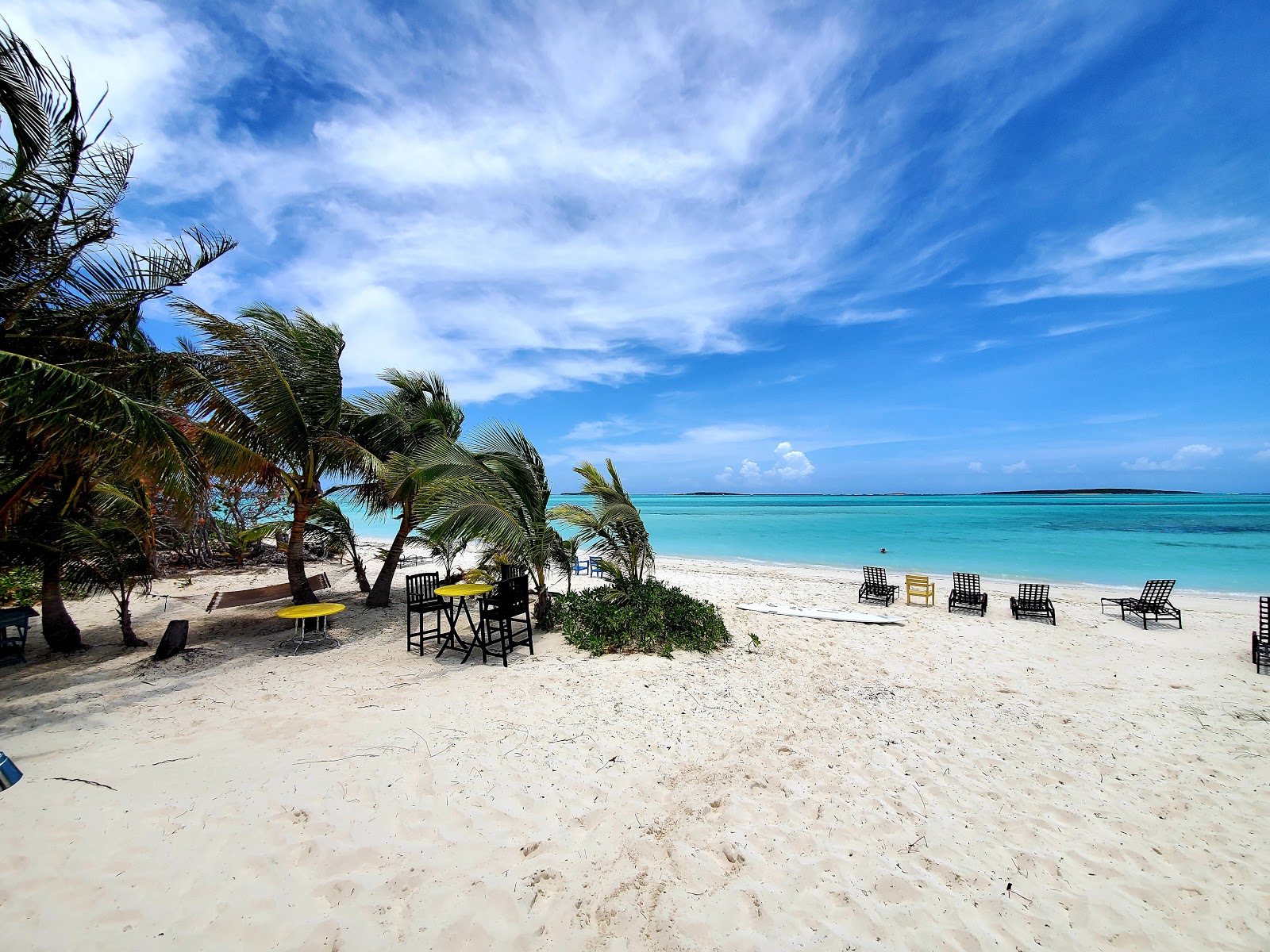 Foto av Cocoplum beach med lång rak strand