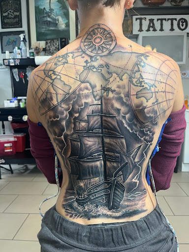 Explore arm sleeve tattoo ideas for guys, creative tattoo ideas in Sarasota, available at SEVEN SINS Tattoo Studio