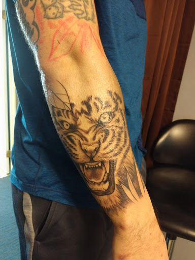 Explore teaching tattoo ideas, creative tattoo ideas in Portsmouth, available at Inflicting Ink, LLC