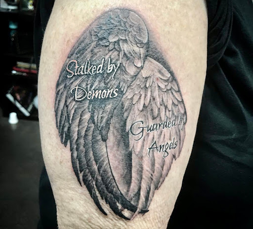 Explore haunted house tattoo ideas, creative tattoo ideas in San Diego, available at SD Tattoo