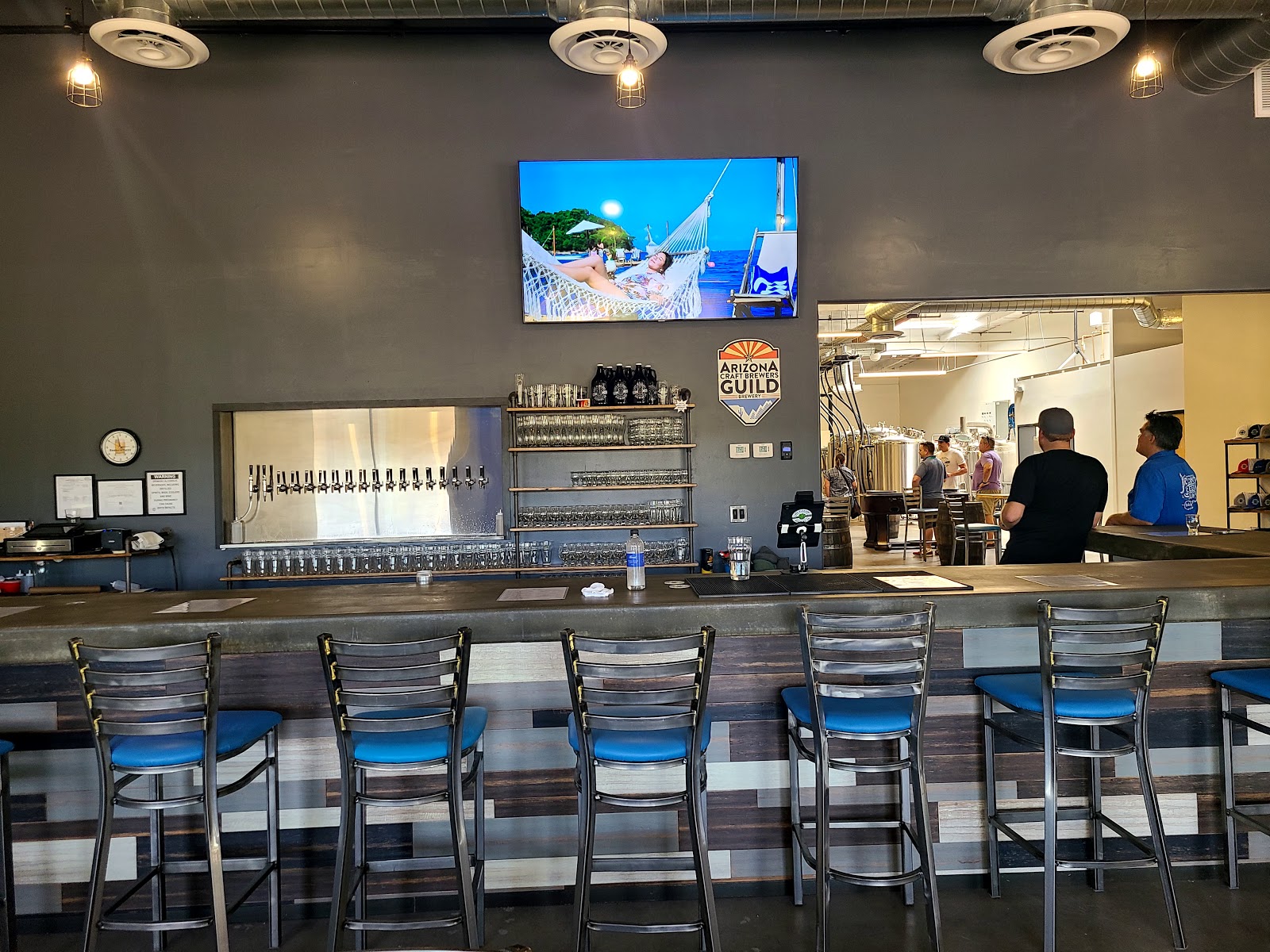 Beer taps lined up on a bar
