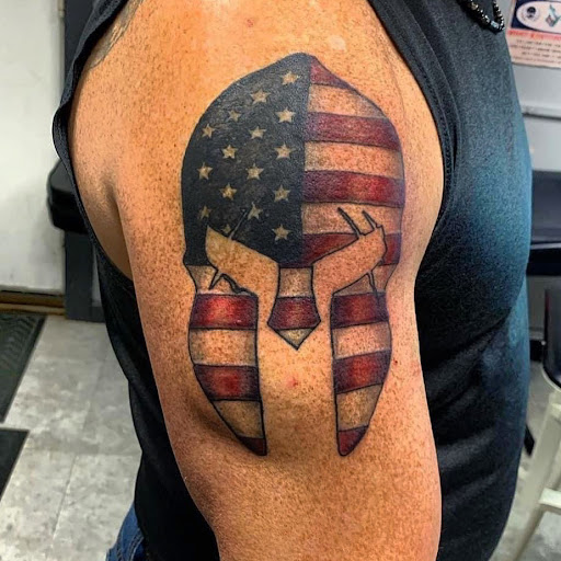 Explore leg tattoo ideas black male, creative tattoo ideas in Hudson Falls, available at ALTERED ADDICTION TATTOOS