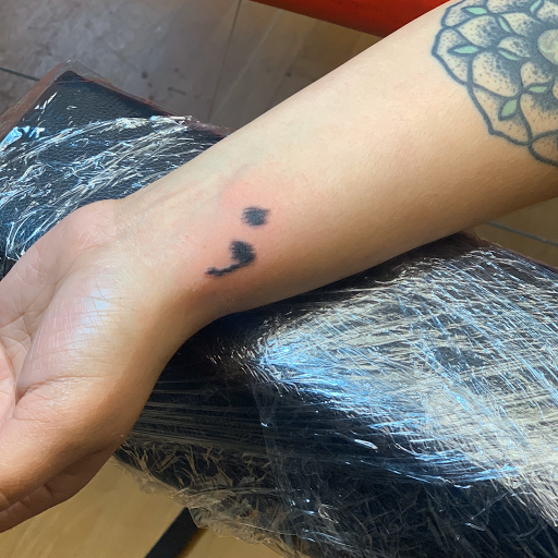 Explore black heart heart tattoo cover up ideas, creative tattoo ideas in Denver, available at Disruptive Ink Tattoos