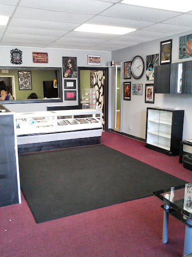 Tattoo Shop «Thriller Ink», reviews and photos, 707 N Reynolds Rd, Toledo, OH 43615, USA