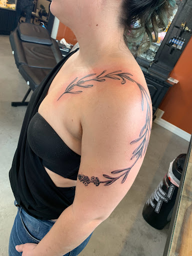 Explore name tattoo cover up ideas, creative tattoo ideas in Great Falls, available at Alpha Tattoos & Piercings