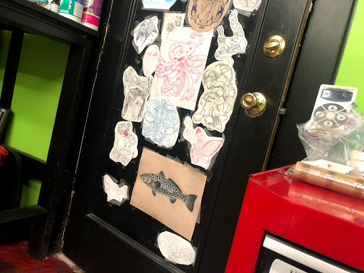 Explore small tattoo ideas behind the ear, creative tattoo ideas in Hernando, available at Blue Panther Tattoo Co