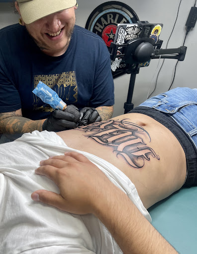 Explore small travel tattoo ideas, creative tattoo ideas in Milwaukee, available at Speakeasy Tattoo Co