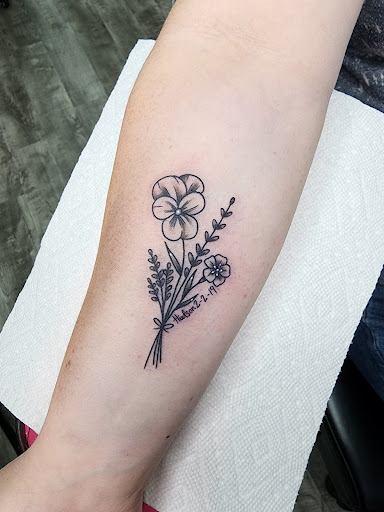 Explore women tattoo ideas back, creative tattoo ideas in Medina, available at Canalside Tattoo Company