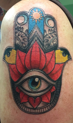 Explore bicep tattoo ideas, creative tattoo ideas in Batavia, available at A Thin Line Tattoo