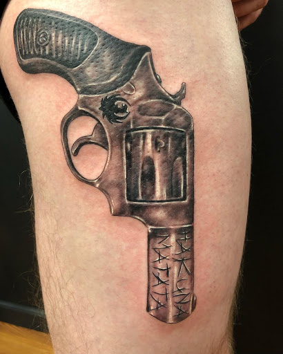 Explore black lab tattoo ideas, creative tattoo ideas in Loveland, available at Moon Light Tattoos