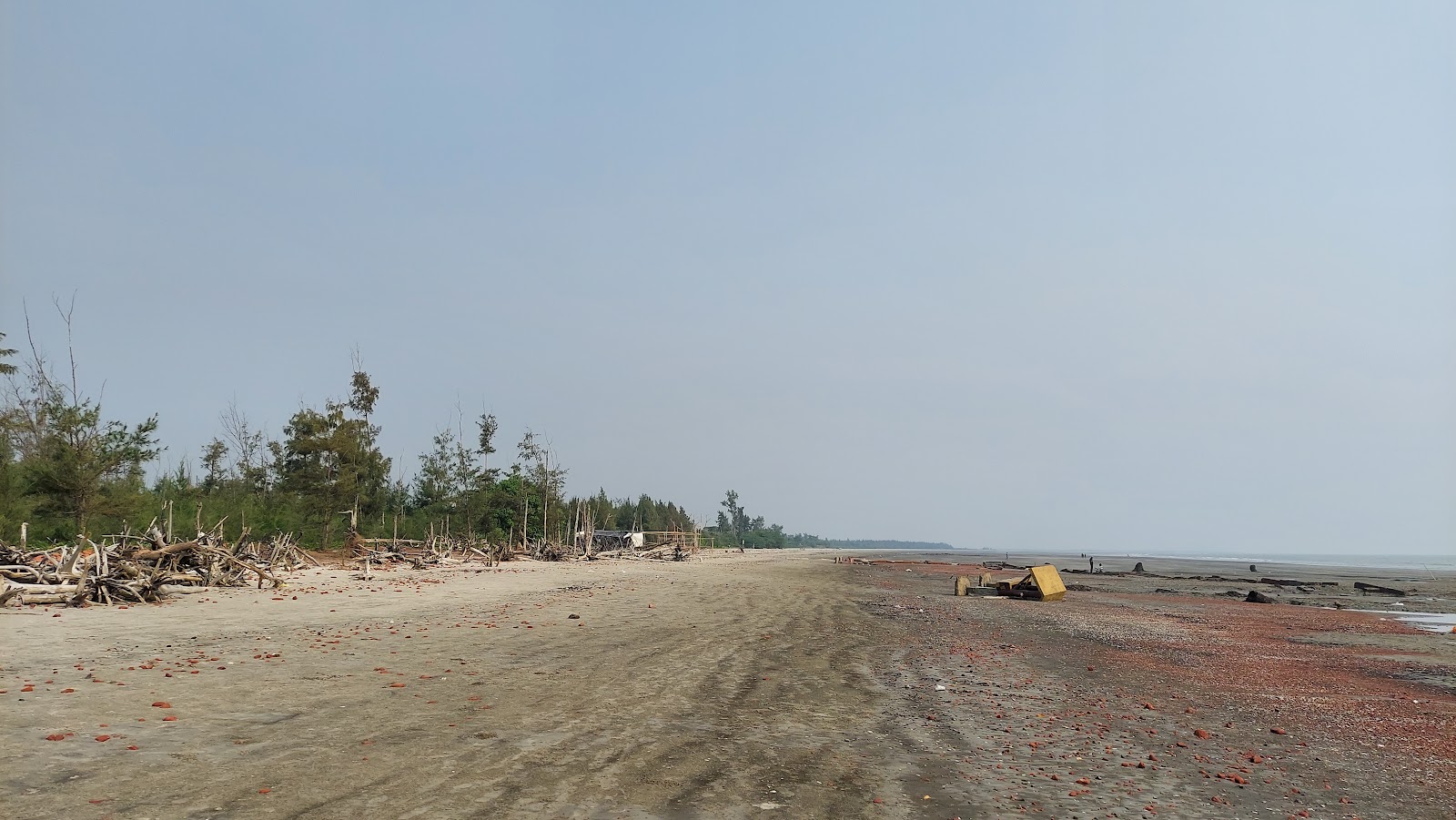 Foto van Gobardhanpur Beach met helder zand oppervlakte