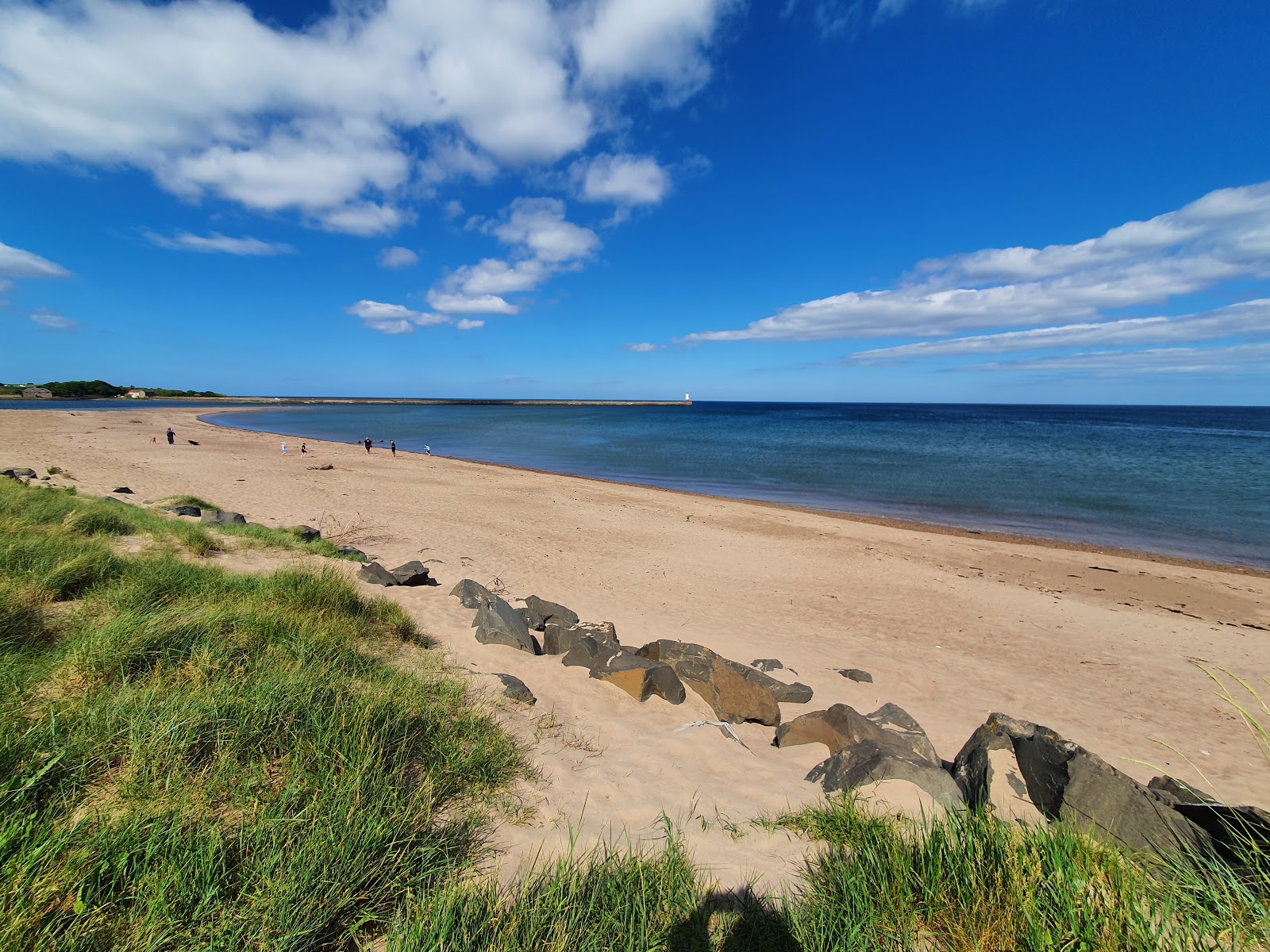 Foto av Spittal beach med beige sand yta