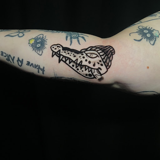 Explore stomach tattoo ideas for females, creative tattoo ideas in Chicago, available at Twisted Tattoo Studio